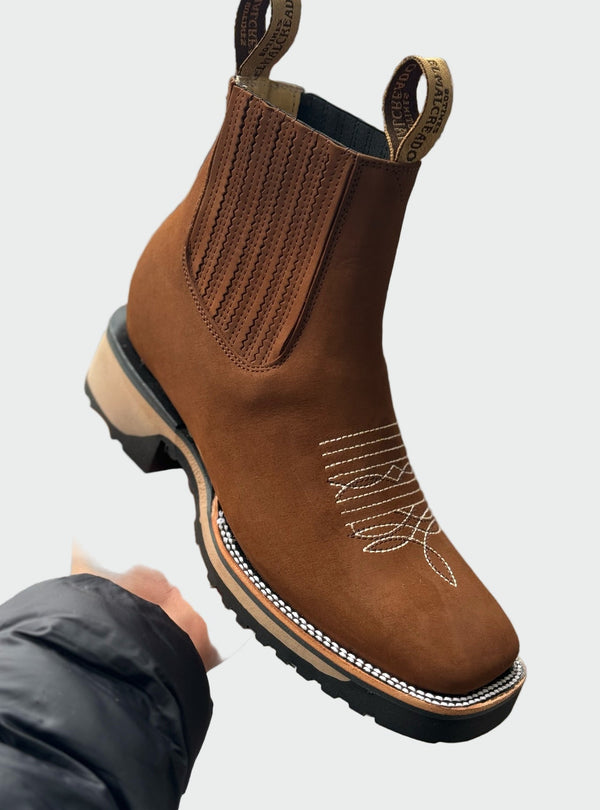 Botas de cowboy em pele